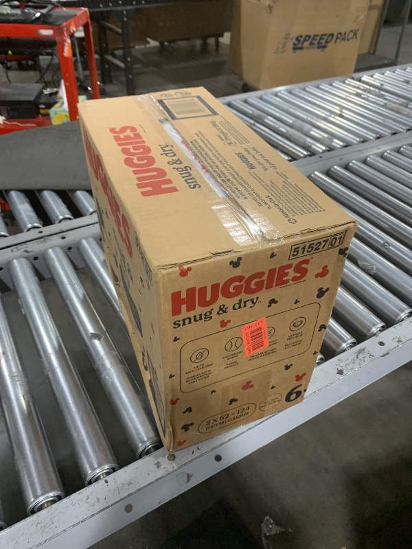 Photo 1 of Huggies Size 6 Diapers, Snug & Dry Baby Diapers, Size 6 (35+ lbs), 124 Count (2 Packs of 62, Packaging May Vary