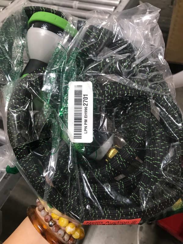Photo 1 of Garden Hose 25 FT, NON-EXPANDABLE Heavy-Duty Flexible & Lightweight Water Hose with 10-Function Nozzle, No-Kink Design, Leak-Proof Super Fabric, Solid Fittings for Lawn, Car, RV
