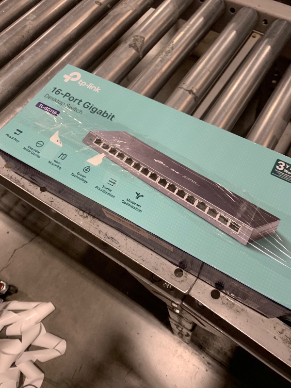 Photo 1 of TP-Link 16 Port Gigabit Ethernet Network Switch, Desktop/ Wall-Mount, Fanless, Sturdy Metal w/ Shielded Ports, Traffic Optimization, Unmanaged (TL-SG116) Black