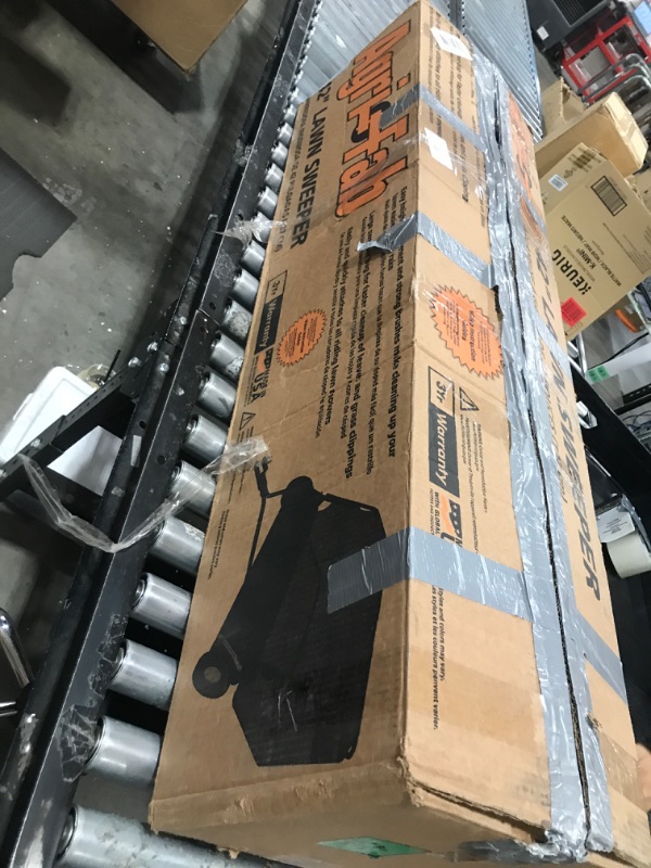 Photo 1 of Agri-Fab 45-0320 42" Tow-Behind Lawn Sweeper, 12 cu. ft Hopper Bag Capacity; Leaf & Grass Catcher, with Adjustable Brush Height and Easy to Use Dumping Rope