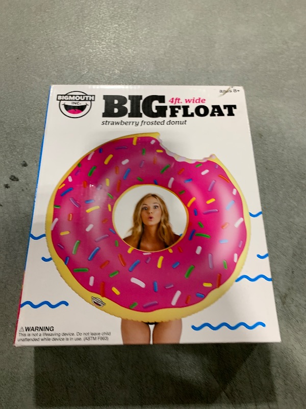 Photo 1 of BigMouth Inc. Giant Frosted Donut Pool Float, 4' Wide, Inflatable Floatie Tube, Blow Up Swim Ring, Outdoor Summer Pool Party Water Toy