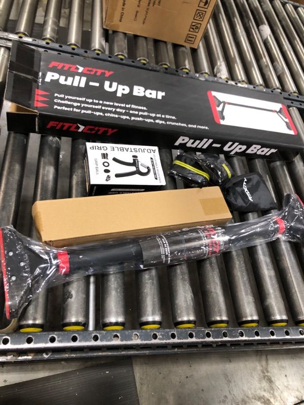 Photo 1 of Fitlicity Pull Up Bar for doorway With Hand Grip Strengthener & Resistance Bands, Chin Up Bar for Upper Body Workout & Exercise, 29.9" - 37.5" Adjustable Width Locking Mechanism, No Screw Installation, 880 lbs