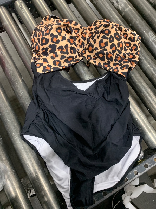 Photo 1 of cheetah print bathing suit 
size unknown