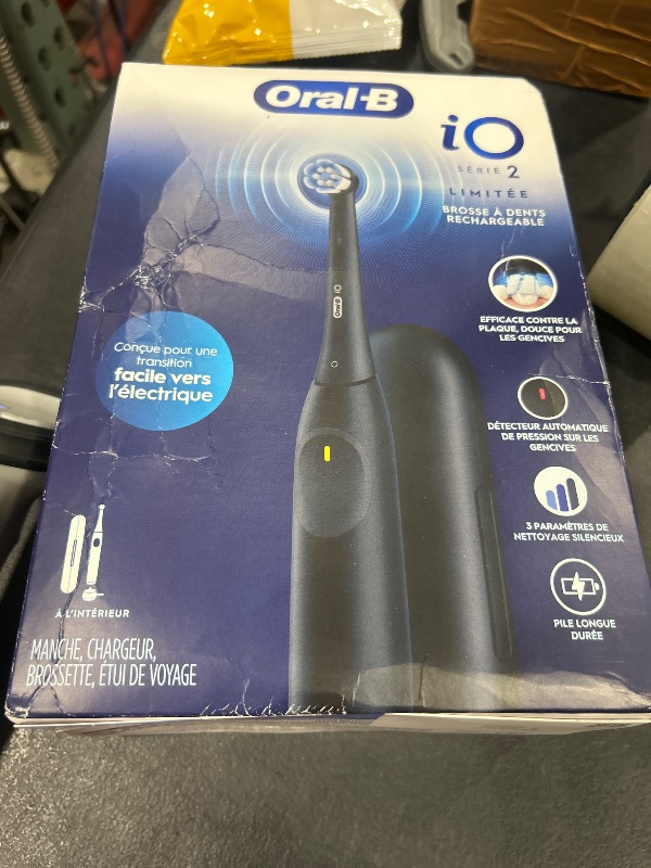 Photo 1 of Oral-B iO Simple Clean Rechargeable Electric Powered Toothbrush, Night Black with 1 Gentle Care Brush Head and 1 Black Travel Case - Automatic Pressure Sensor to Protect Gums - 3 Modes - 2 Min Timer