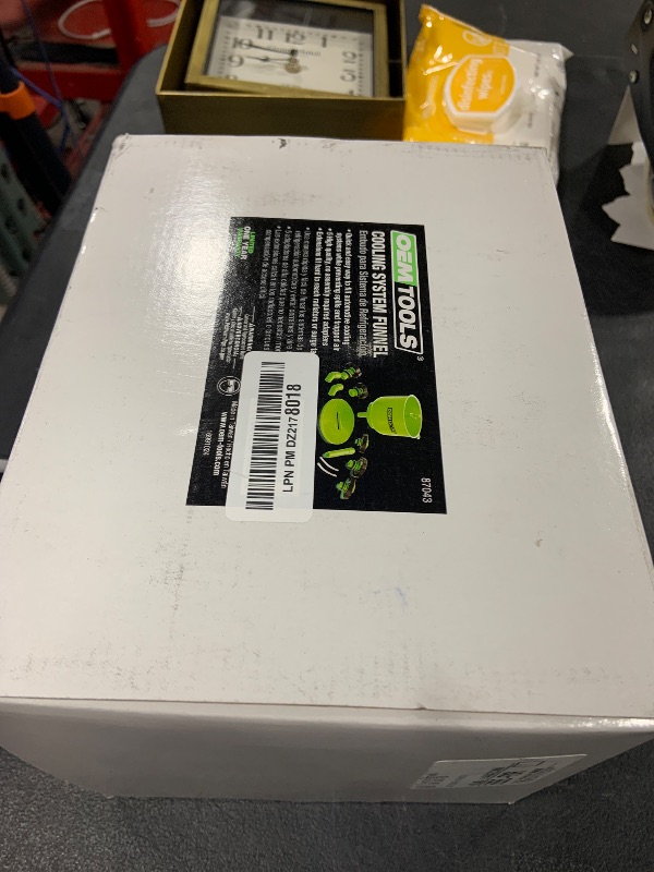 Photo 1 of OEMTOOLS 87043 No-Spill Professional Coolant Funnel Kit, Easily Fill Antifreeze Coolant Set Includes 5 Adapters, Extensions, and Automotive Funnel, Air Venting, Drip-Free, Green