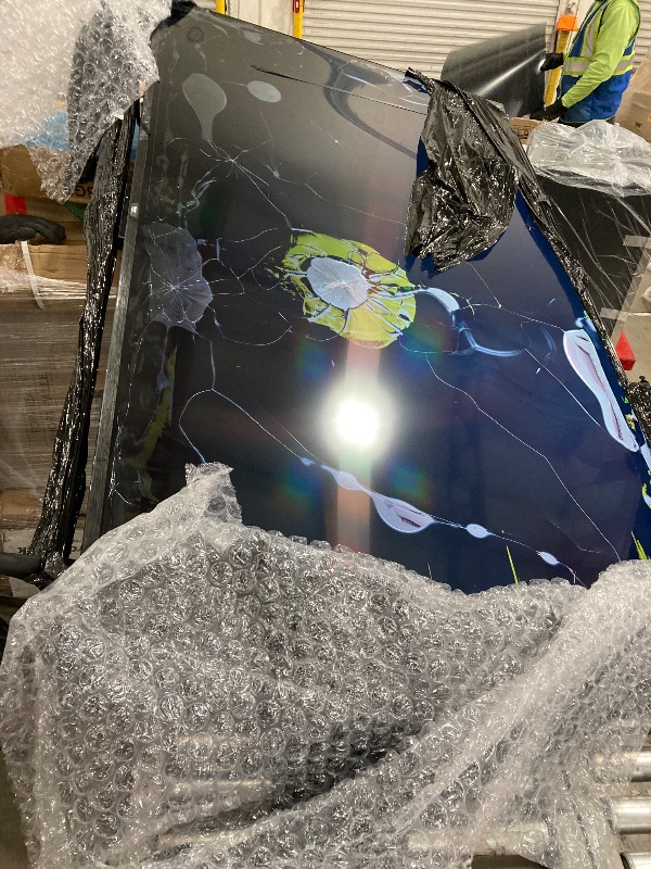 Photo 1 of **SMASHED TV**AMAZON FIRE TV 80 INCH 