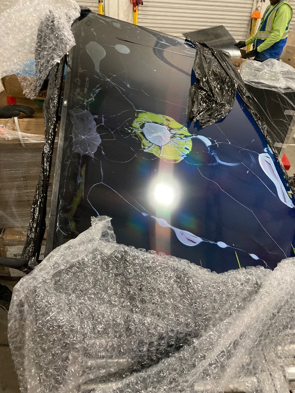 Photo 1 of **SMASHED TV**AMAZON FIRE TV 80 INCH 