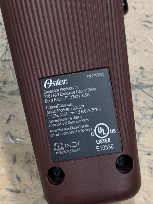 Photo 1 of Oster Professional Cordless Hair Clippers, Fast Feed for Barbers and Hair Cutting with Detachable Blade, Burgundy