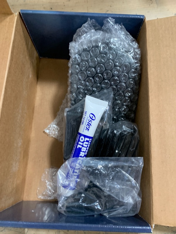 Photo 1 of Oster Professional Cordless Hair Clippers, Fast Feed for Barbers and Hair Cutting with Detachable Blade, Burgundy