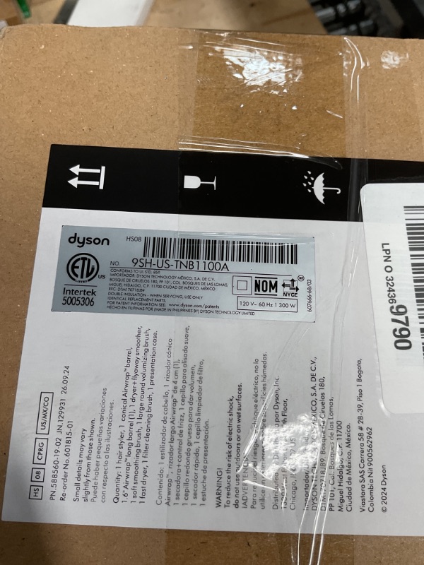 Photo 1 of Dyson Airwrap i.d.™ Multi-Styler and Dryer Straight+Wavy in Ceramic Pink and Rose Gold