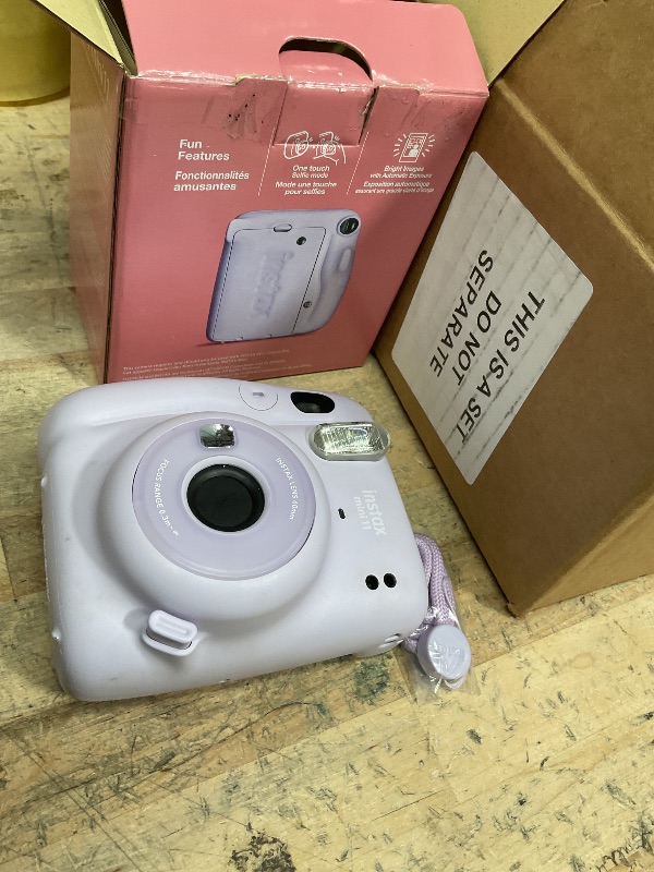 Photo 1 of Fujifilm Instax Mini 11 Camera with Fujifilm Instant Mini Film (60 Sheets) Bundle with Deals Number One Accessories Including Carrying Case, Selfie Lens, Photo Album, Stickers (Lilac Purple)