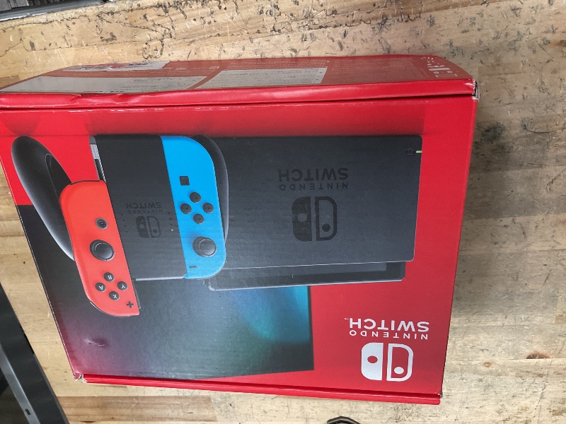 Photo 1 of Nintendo Switch with Neon Blue & Neon Red Joy-Con