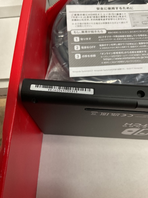 Photo 1 of Nintendo Switch with Neon Blue & Neon Red Joy-Con