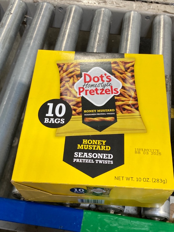Photo 1 of **EPIRED 3/2025**
Dot's Pretzels Honey Mustard Seasoned Pretzel Twist Snack, 1oz Individually Sized Bag (10 Count)