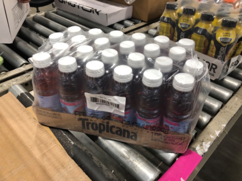 Photo 1 of ****EXPIRED NO RETURN****Tropicana 100% Fruit Medley Juice, Single Serve, 10 Fl Oz Bottles (Pack of 24) - Real Fruit Juice, Vitamin C, B & E Rich, No Added Sugars, No Artificial Flavors