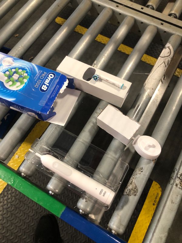 Photo 1 of ***brush might be used, sell for parts*** Oral-B Pro 1000 Rechargeable Electric Toothbrush, White