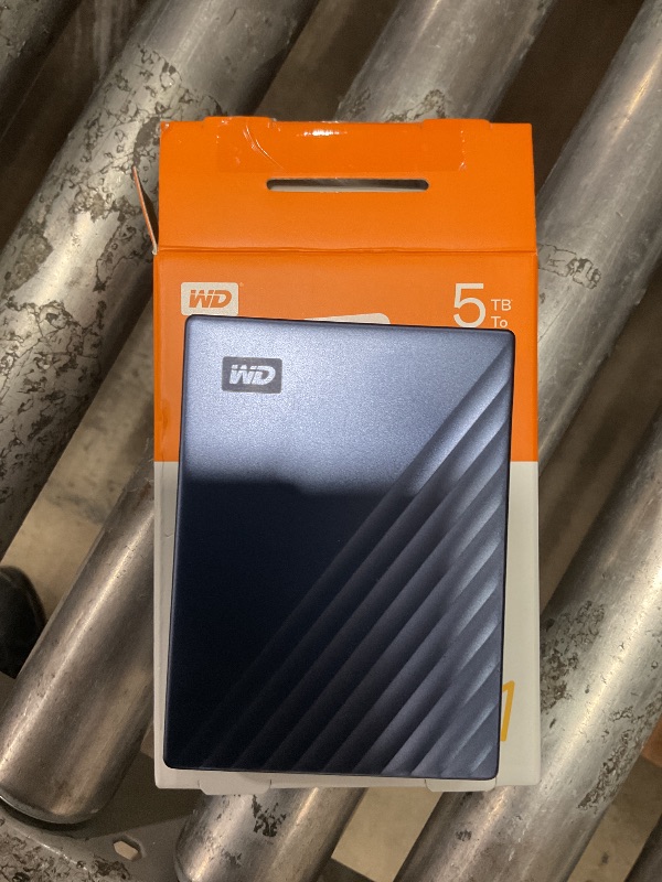 Photo 1 of **PASSWORD ENCRYPTED FROM PREVIOUS USE** WD 5TB My Passport Ultra, Blue, Portable External Hard Drive, backup software with defense against ransomware, and password protection, USB-C and USB 3.1 - WDBFTM0050BBL-WESN