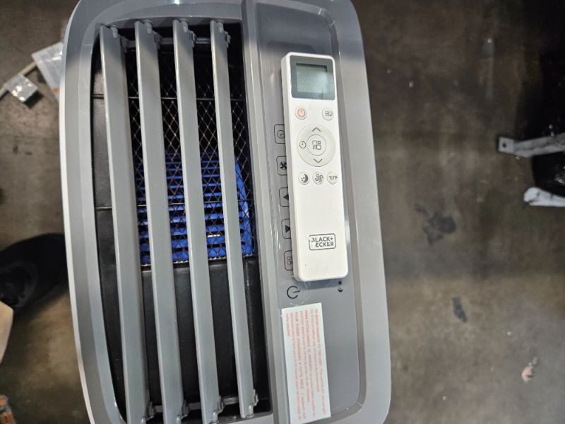 Photo 1 of ** For parts only does not power on **  BLACK+DECKER Portable Air Conditioner, 9,000 BTU (5,300 BTU SACC) for Rooms up to 400 Sq. Ft., Portable AC with Follow Me Remote Control and Window Kit, BPACT08WT, White