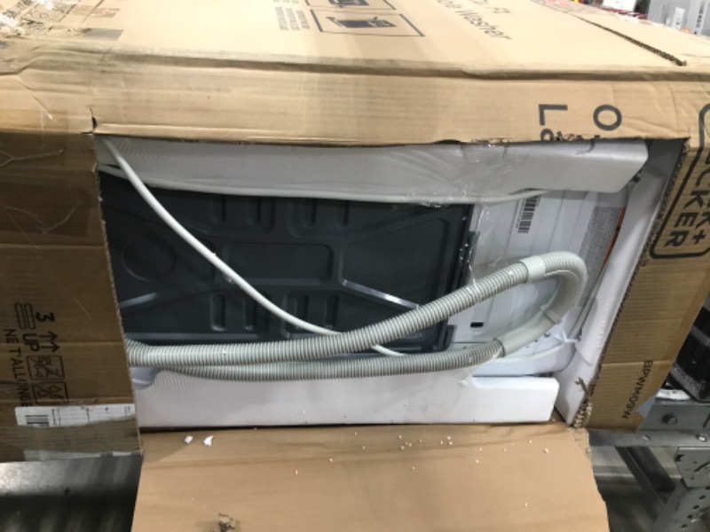 Photo 1 of ***************Doesn't work properly. Doesn't drain water*************
BLACK+DECKER 0.9 Cu. Ft. Portable Washer, 6.6 lb. Capacity Washing Machine for Homes & Apartments, 5 Wash Cycles, Quick Connect Sink Adapter and Drain Hose Included, Transparent Lid, B
