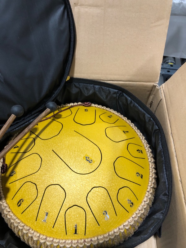 Photo 1 of HOPWELL Steel Tongue Drum - 13 Inches 15 Notes Tongue Drum - Hand Pan Drum with Music Book, Drum Mallets and Carry Bag, D Major (Yellow)