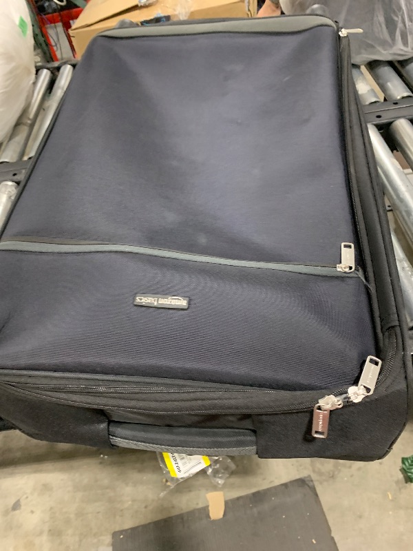 Photo 1 of Amazon Basics Luggage, 30" Large Checked Softside Suitcase With Wheels, With Four 360-Degree Multi-directional Spinner Wheels, Expandable Space, Zippered Pocket and Straps, Telescopic Handle, Black
