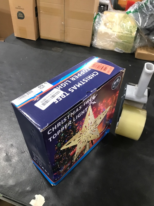 Photo 1 of DG-Direct Christmas Tree Topper Lighted Star [Gold],3D Hollow Sparkling Star Christmas Tree Topper with Rotating Magic Cool White Snowflake Projector for Christmas Tree Ornament (Gold)