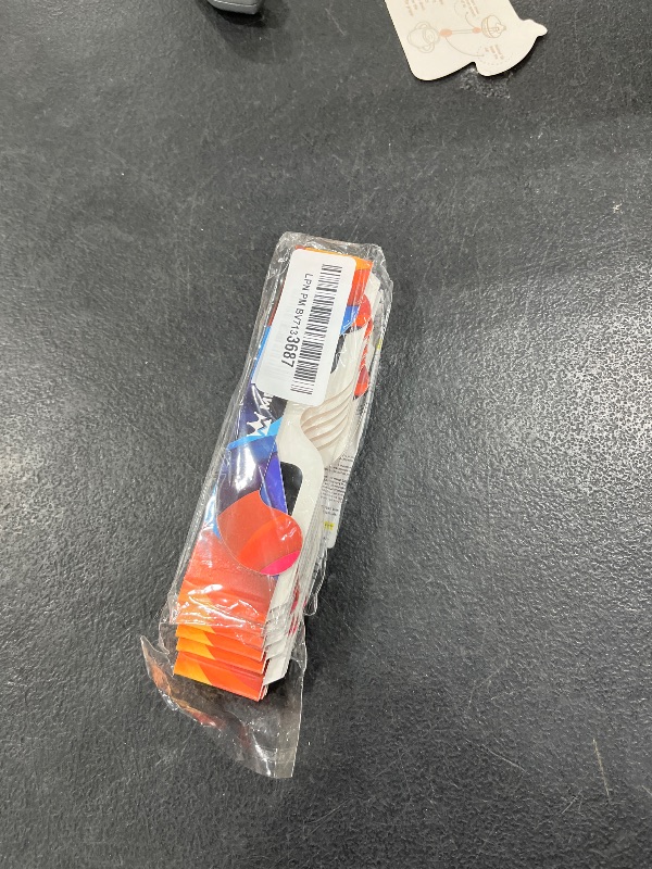 Photo 1 of set of paper eclipse glasses