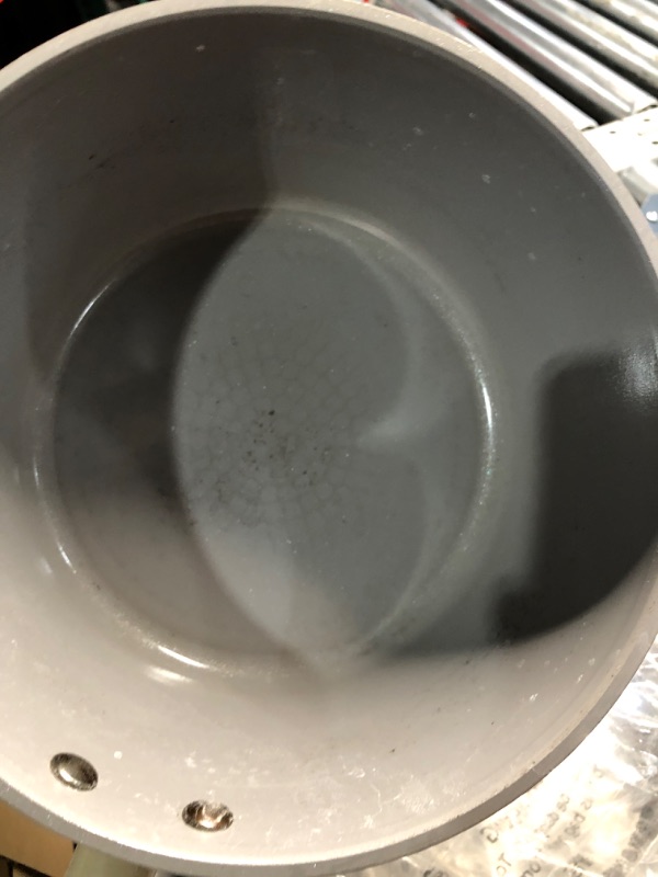 Photo 1 of ***(HEAVILY USED)***
ROCKURWOK Ceramic Nonstick Sauce Pan, 3 QT Pot with Steamer, Non Toxic & PFAS-Free, Wooden Handle for Cool Touch, Universal Base(Gas, Electric & Induction), White