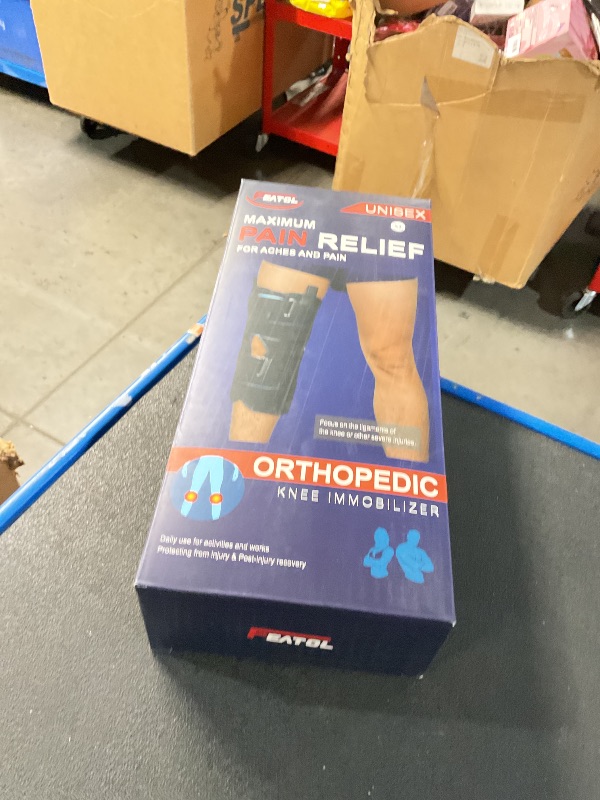Photo 1 of FEATOL Knee Immobilizer 3-Panel Knee Brace for Pain Relief 2.5 '' Thick Cushion Adjustable Side Panels Splint for Men and Women ACL, PCL, Post-Surgery, Injury Recovery, X-Large