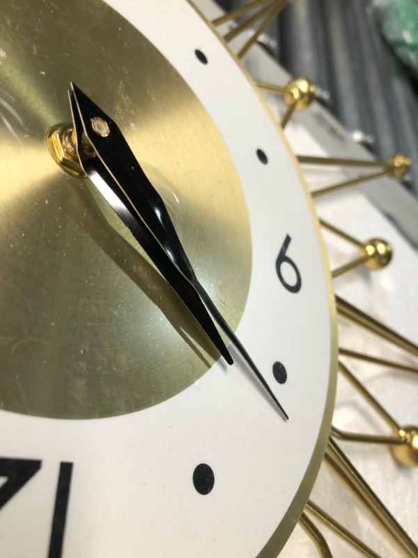 Photo 1 of ***DAMAGED - ARMS BENT - NO BATTERY - UNABLE TO TEST - SEE PICTURES***
Lafocuse 23 Inch Metal Gold Starburst Wall Clock, Large Mid Century Modern Wall Clocks, Art Deco Wall Clocks for Living Room Kitchen Office