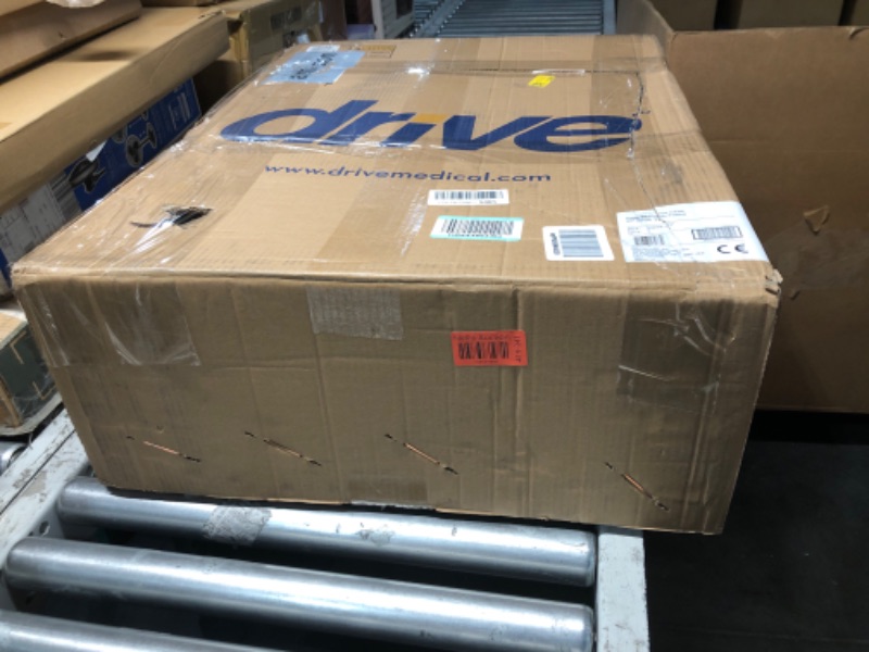 Photo 1 of Drive Medical Transport Wheelchair Steel 17 inch Seat Width x 16"D 250 lbs. 
