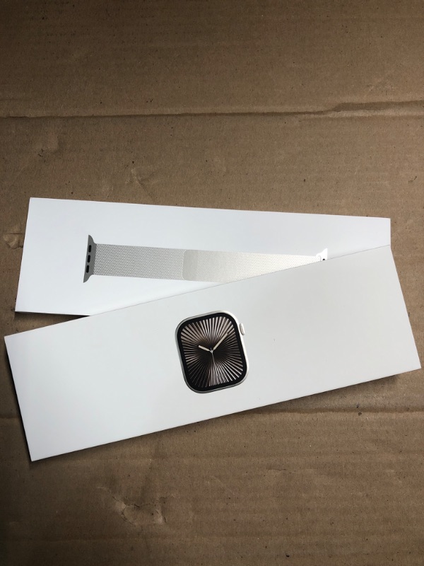Photo 1 of **SEE NOTES**
Apple Watch Series 10 [GPS + Cellular 42mm case] Smartwatch with Natural Titanium Case with Natural Milanese Loop. Fitness Tracker, ECG App, Always-On Retina Display, Carbon Neutral