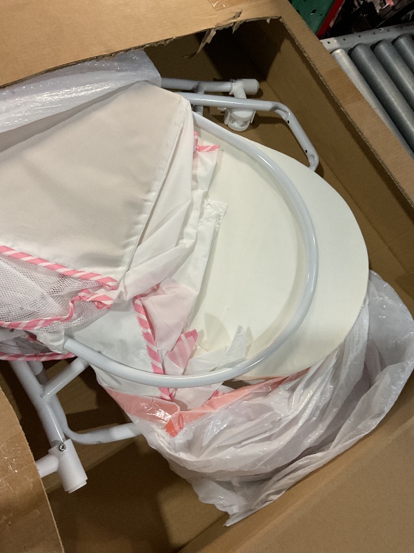 Photo 1 of (Used)(see all images)Dream On Me Lacy Portable 2-in-1 Bassinet & Cradle in Pink and White, Lightweight Baby Bassinet with Storage Basket, Adjustable and Removable Canopy