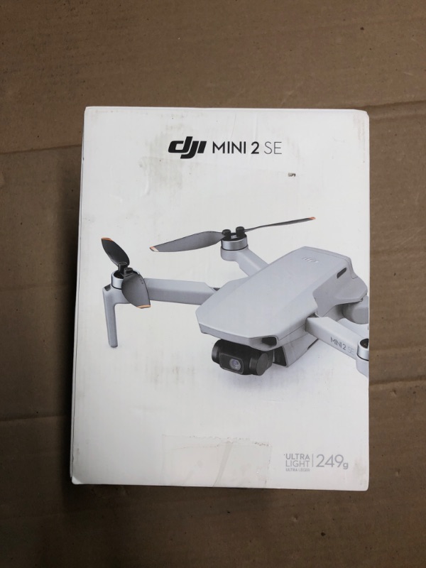 Photo 1 of ** PARTS ONLY BROKEN ITEM ** DJI Mini 2 SE, Lightweight Mini Drone with QHD Video, 10km Max Video Transmission, 31-Min Flight Time, Under 249 g, Auto Return to Home, 3-Axis Gimbal Drone with Camera for Beginners