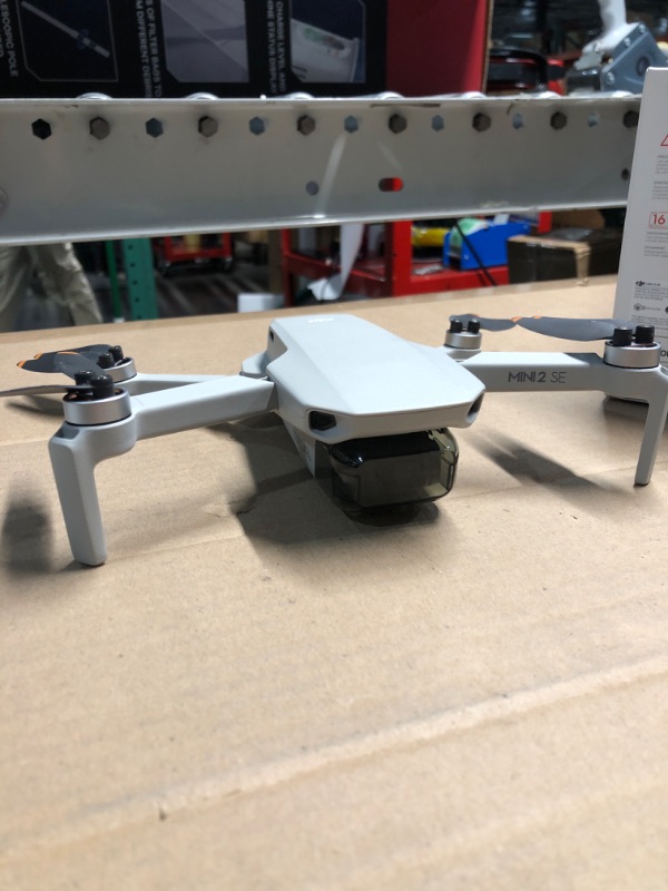 Photo 1 of ** PARTS ONLY BROKEN ITEM ** DJI Mini 2 SE, Lightweight Mini Drone with QHD Video, 10km Max Video Transmission, 31-Min Flight Time, Under 249 g, Auto Return to Home, 3-Axis Gimbal Drone with Camera for Beginners