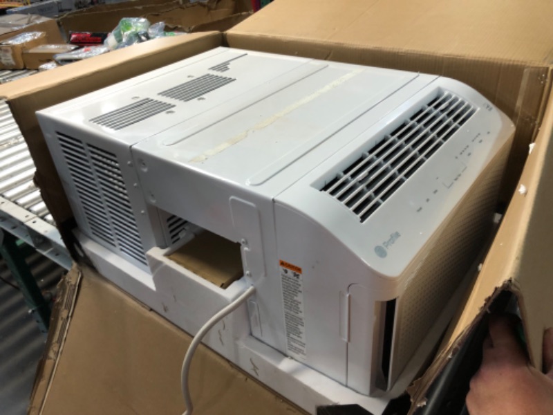 Photo 1 of ***HEAVILY USED AND DIRTY - SEE PICTURES - UNABLE TO TEST - LIKELY MISSING PARTS***
GE Profile ClearView Inverter Window AirConditioner Unit, 12,200 BTU,115 Volt,U-Shaped Adjustable Depth,Energy Efficient Cooling up to 550 sq ft.,Ultra Quiet, SMART Home C
