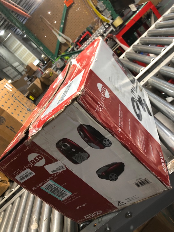 Photo 1 of **CORD IS CUT, NOT FUNCTIONAL-PARTS ONLY**
Atrix - Turbo Red HC1-AMZ Canister Vacuum with 6 Quart HEPA Filter and Variable Speed Motor