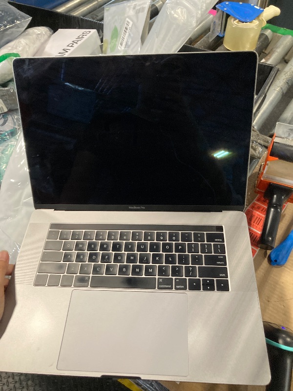 Photo 1 of ***DOESN'T TURN ON, PARTS ONLY***
Apple MacBook Pro Late 2019 with 2.6GHz Intel Core i7 (16 inch, 16GB RAM, 512GB) Space Gray (Renewed)