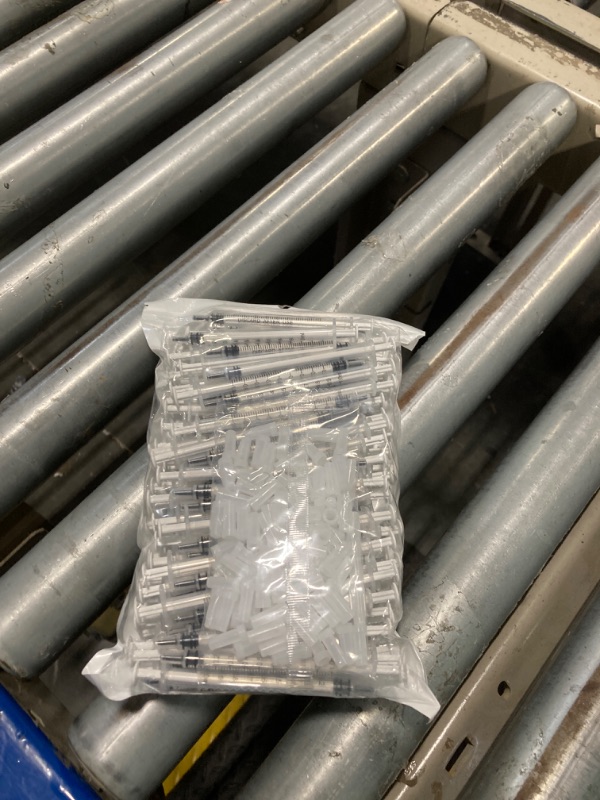 Photo 1 of 100 Pack 1ml Syringe with Cap for Liquid, 1cc Plastic Small Syringes with Cover, Non-Sterile, No Needle