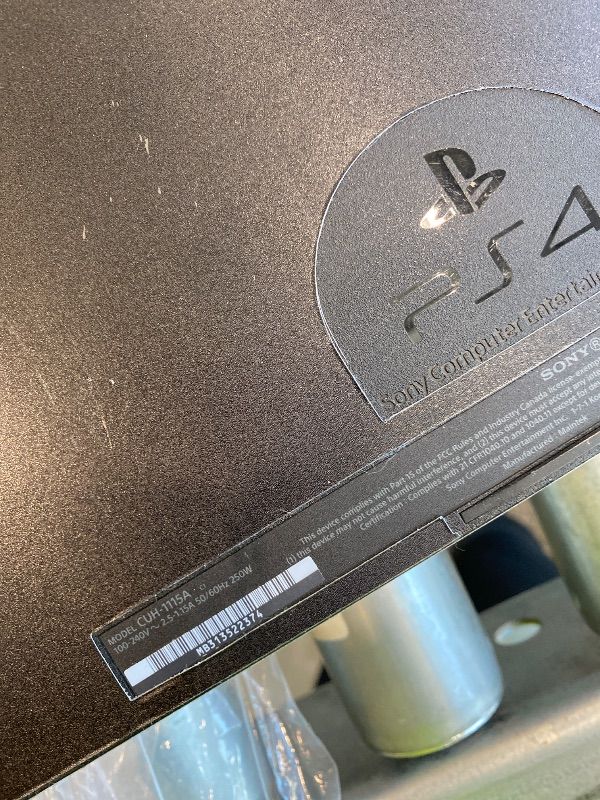 Photo 1 of *Minor Damaged - Check clerk notes*
Sony PlayStation 4 500GB Console (Renewed)