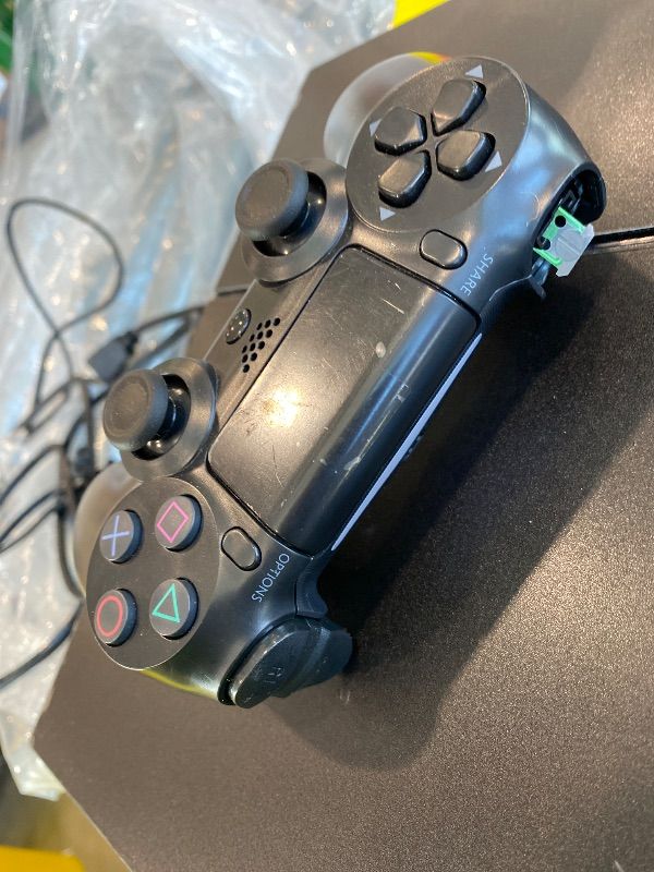 Photo 1 of *Minor Damaged - Check clerk notes*
Sony PlayStation 4 500GB Console (Renewed)