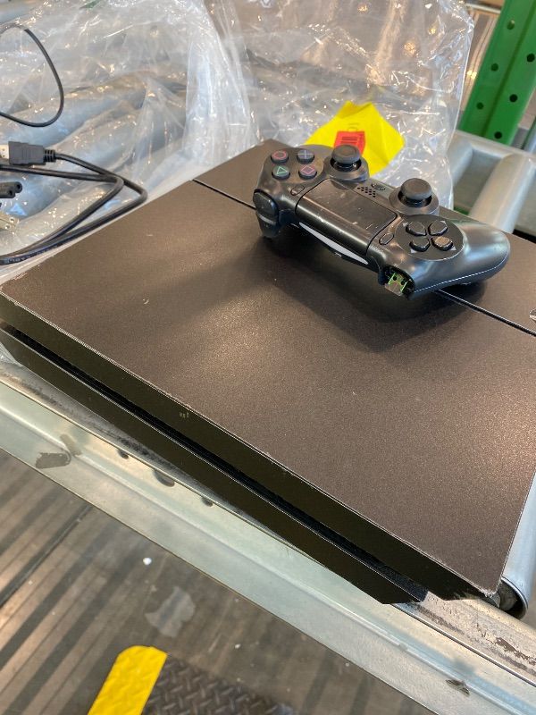 Photo 1 of *Minor Damaged - Check clerk notes*
Sony PlayStation 4 500GB Console (Renewed)