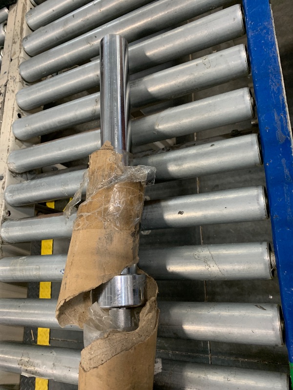 Photo 1 of 2 in olympic barbell