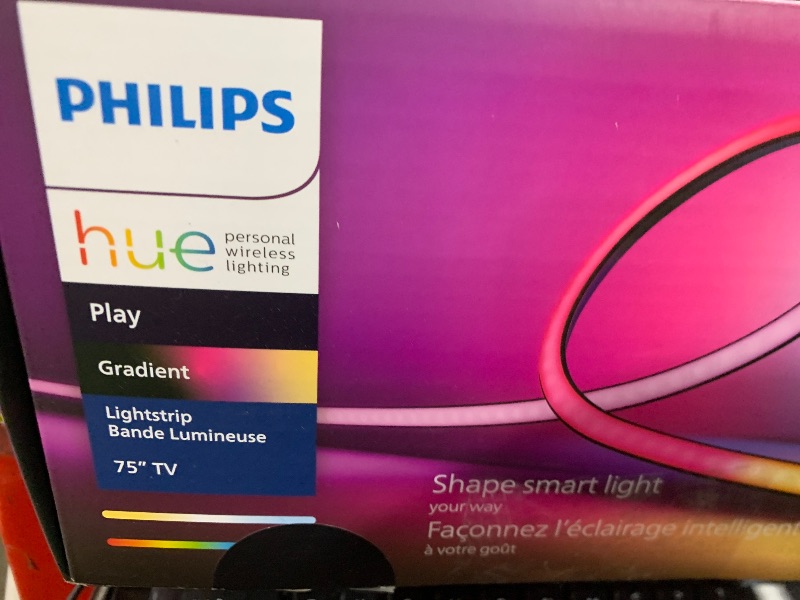 Photo 1 of Philips Hue 75" Smart TV Light Strip - White and Color Ambiance LED Color-Changing TV Backlight - Sync with TV, Music, and Gaming - Requires Bridge and Sync Box - Control with App or Voice Assistant