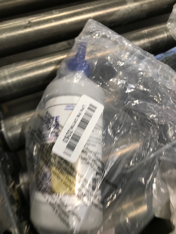 Photo 1 of Bluestar Flexible Concrete Crack Filler (Gray), DIY - No Special Tools Needed, Fill Cracks in Concrete Driveways, Sidewalks, Patios, Garage and Basement Floors. 16 fl. oz. Bottle.