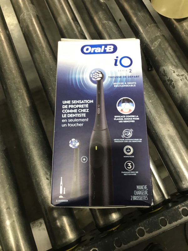 Photo 1 of Oral-B iO Series 2 Rechargeable Electric Powered Toothbrush Starter Kit, Night Black with 2 Brush Heads - Automatic Pressure Sensor to Protect Gums - 3 Modes - 2 Min Timer