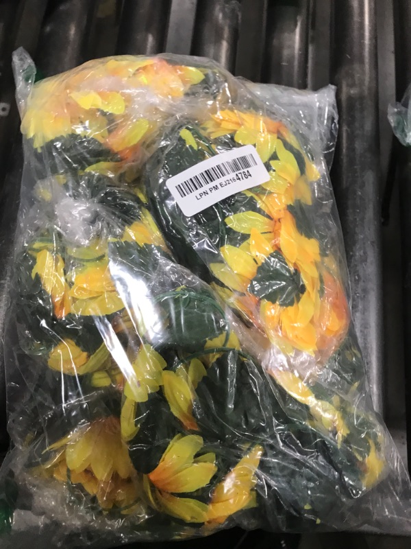 Photo 1 of Uieke 10 Pack Artificial Sunflower Garland, 7ft/Pcs Silk Sunflowers with Green Leaves, Flowers Vines for Room Home Kitchen Garden Wedding Arch Bridal Baby Shower Party Outdoor Decor