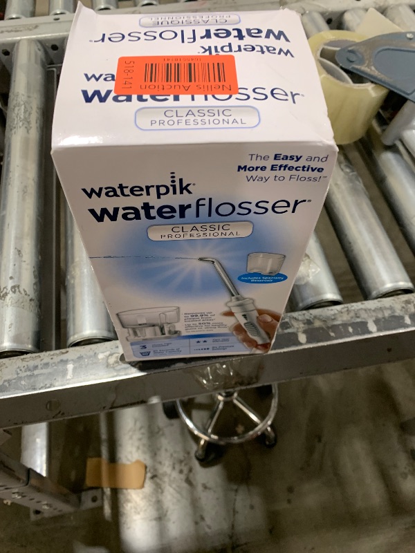 Photo 1 of Waterpik Classic Professional Water Flosser, Electric Power With 6 Settings, 3 Flossing Tips, ADA Accepted, White WP-72