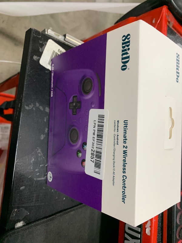 Photo 1 of 8Bitdo Ultimate 2 Wireless Gaming Controller with TMR Joysticks, Switchable Hall Effect/Tactile Triggers, 8Speed Wireless Tech, Charging Dock, RGB Fire Ring for PC & Android - Purper