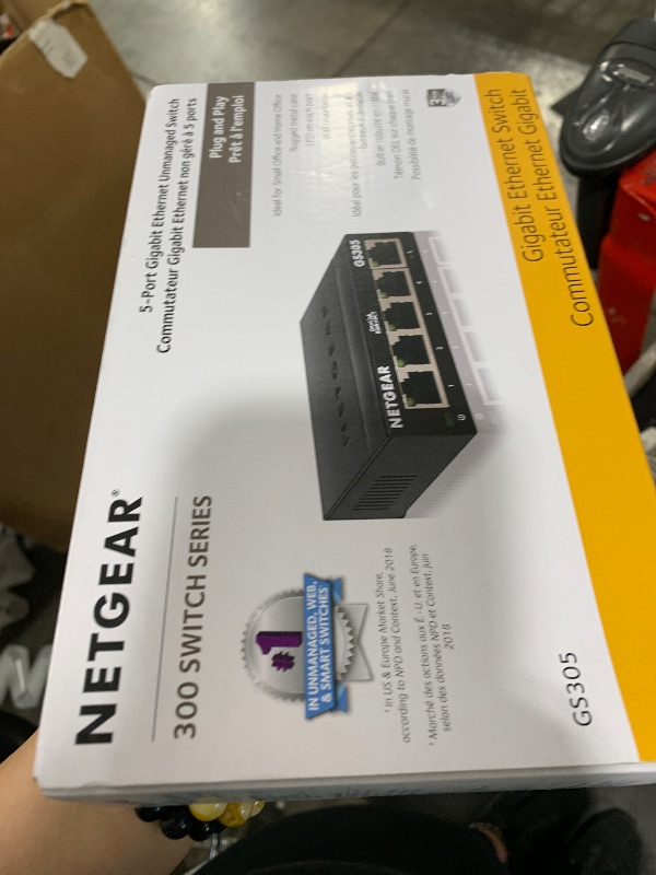 Photo 1 of NETGEAR 5-Port Gigabit Ethernet Unmanaged Essentials Switch (GS305) - Home Network Hub, Office Ethernet Splitter, Plug-and-Play, Silent Operation, Desktop or Wall Mount